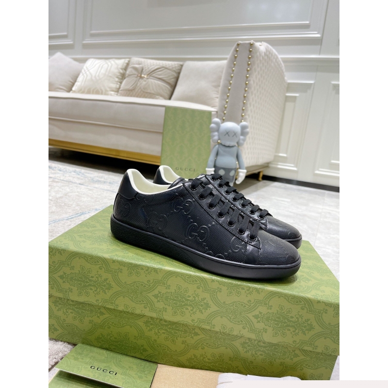 G*u*i sneakers
